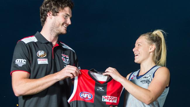 Dylan Roberton presents Southern Women’s Academy captain Dana Debondt with her jersey.