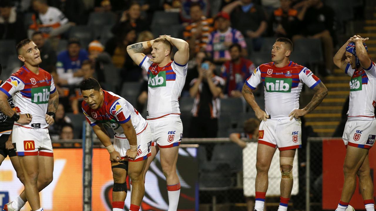 Knights players react during their loss to the Tigers