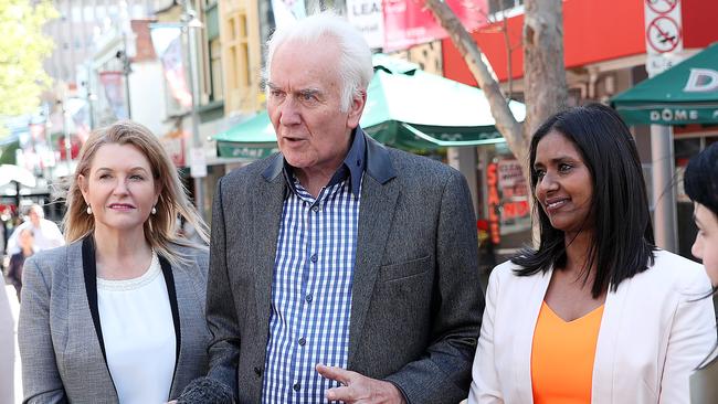 Damon Thomas, centre, speaking on low interest in local government elections with fellow candidates Tanya Denison, left, and Zelinda Sherlock in Elizabeth Mall. Picture: SAM ROSEWARNE