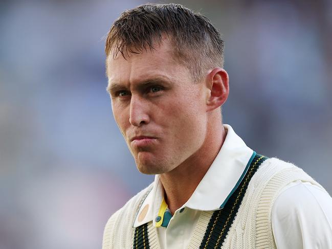 PERTH, AUSTRALIA - NOVEMBER 22: Marnus Labuschagne of Australia walks off the field after being dismissed by Mohammed Siraj of India for 2 runs during day one of the First Test match in the series between Australia and India at Perth Stadium on November 22, 2024 in Perth, Australia. (Photo by Cameron Spencer/Getty Images)