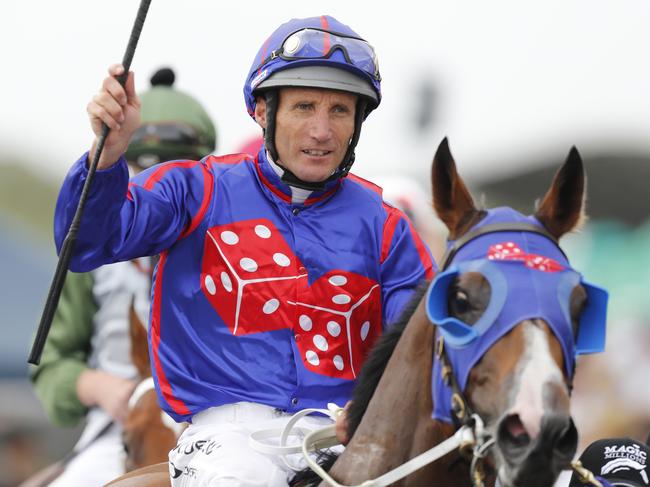 GOLD COAST, AUSTRALIA - JANUARY 11: Damien Oliver rides Hell Hunt Us celebrates his victory in the Magic Millions Maiden Plate race during the 2019 Magic Millions at the Gold Coast Turf Club on January 11, 2020 in Gold Coast, Australia. (Photo by Regi Varghese/Getty Images)