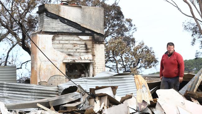 Jared McArdle of the Taljar Polwarth stud at Parndana lost two family homes in the fire and about 15 per cent of their sheep flock. Picture: Tait Schmaal