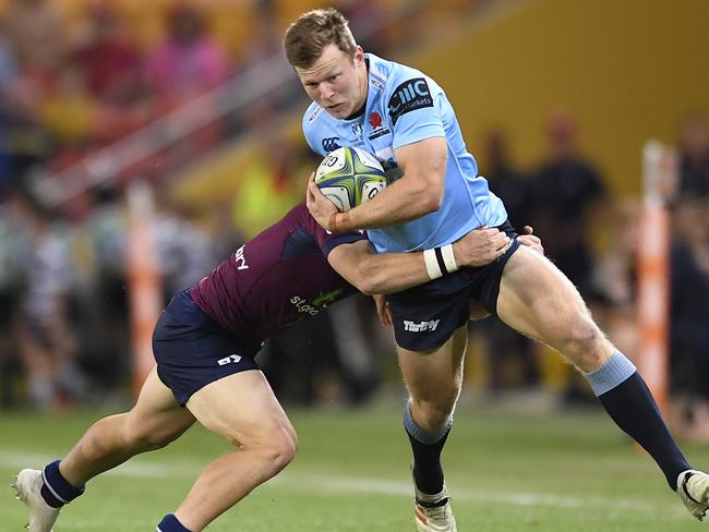 BRISBANE, AUSTRALIA - MAY 18: Cameron Clark of the Waratahs is tackled during the round 14 Super Rugby match between the Reds and the Waratahs at Suncorp Stadium on May 18, 2019 in Brisbane, Australia. (Photo by Albert Perez/Getty Images)