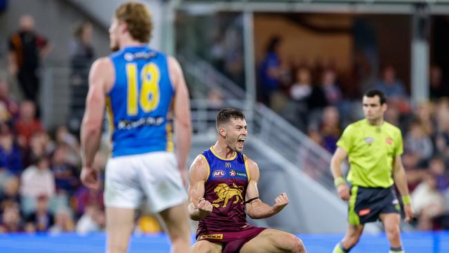 BRISBANE, AUSTRALIA - MAY 05: Josh Dunkley of the Lions celebrates a goal during the 2024 AFL Round 08 match between the Brisbane Lions and the Gold Coast SUNS at The Gabba on May 05, 2024 in Brisbane, Australia. (Photo by Russell Freeman/AFL Photos via Getty Images)