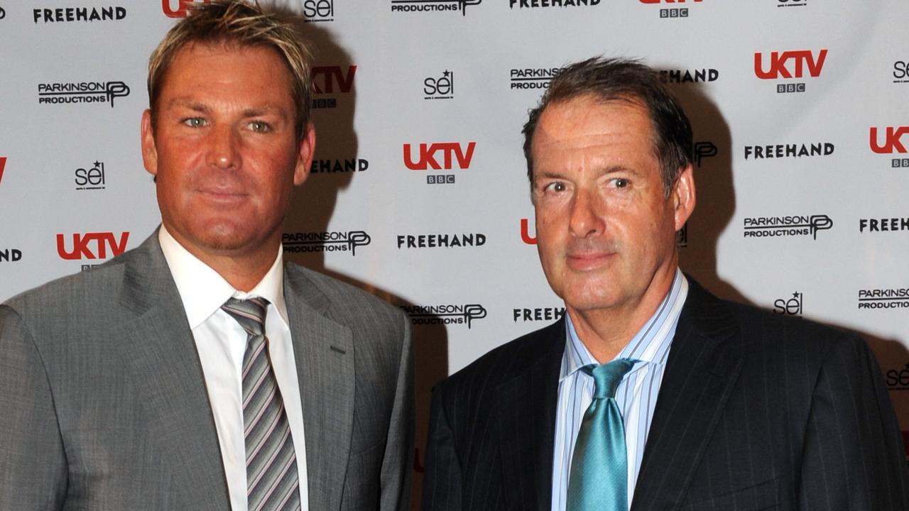 Shane Warne and his manager James Erskine. Picture: AAP