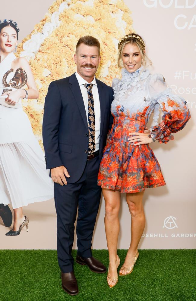 Candice Warner with husband David Warner posing for photos at Rosehill Gardens. Picture: Supplied