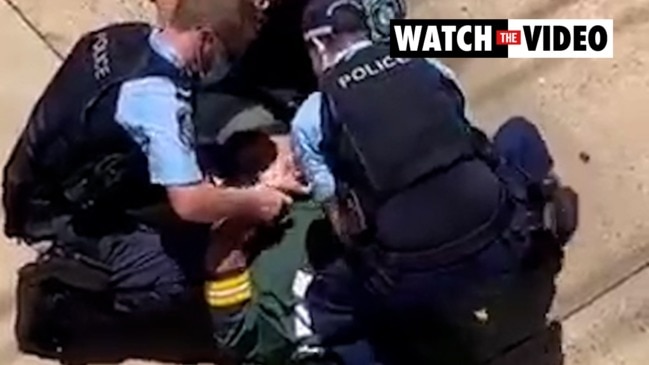 Man pinned down by police over alleged taxi incident