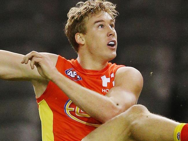 MELBOURNE, AUSTRALIA - APRIL 29:  Tom Lynch of the Suns kicks the ball for a goal during the round six AFL match between the North Melbourne Kangaroos and the Gold Coast Suns at Etihad Stadium on April 29, 2017 in Melbourne, Australia.  (Photo by Michael Dodge/Getty Images)