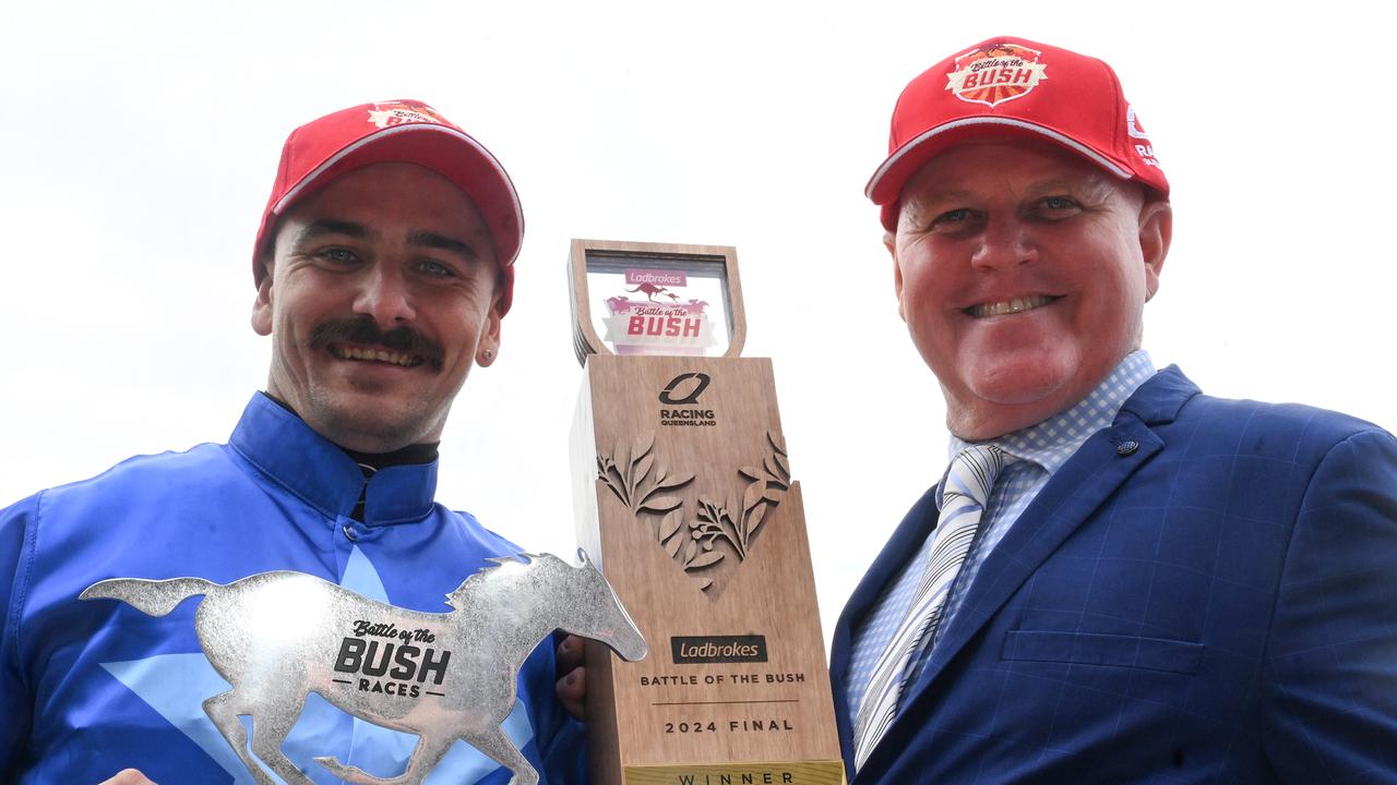 Tiger Legend wins the Battle Of The Bush final at Eagle Farm for jockey Ash Butler and trainer John Manzelmann. Picture: Grant Peters - Trackside Photography.