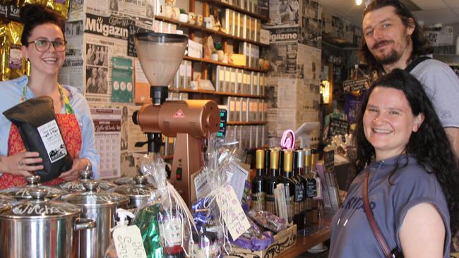 Coffee Works manager Lauren Murphy at the 46 Spence St, Cairns City store with customers Catherine Hicks and Ken Nixon. Picture: Alison Paterson