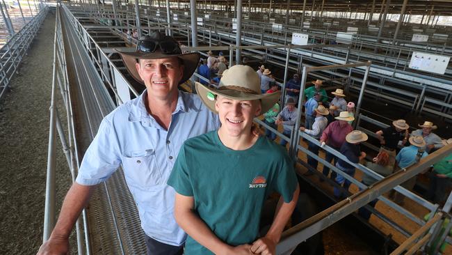 Peter Boyd and his son Israel Boyd, 14, from Myrtleford, sold 140 Angus weaners at the Wodonga weaner sale. Picture: Fiona Myers