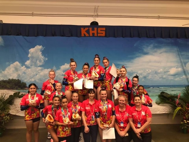 Toowoomba PCYC Gymnastic Club members (from back left) Amber Hartvigsen, Emily Box, Sami Nobbs, Courtney Thomson, Zahli Pratt, Hannah Quinn, Ryanda Craige, Kelsey-Rae Terry, Gemma Osmond, Cadence West, (front left) Emily Lindsay,  Emily Miller, Sam Lowery, Rachel Pingel, Elina Schmidt, Maree Chin, Pretoria Naumann celebrate their success in Hawaii.