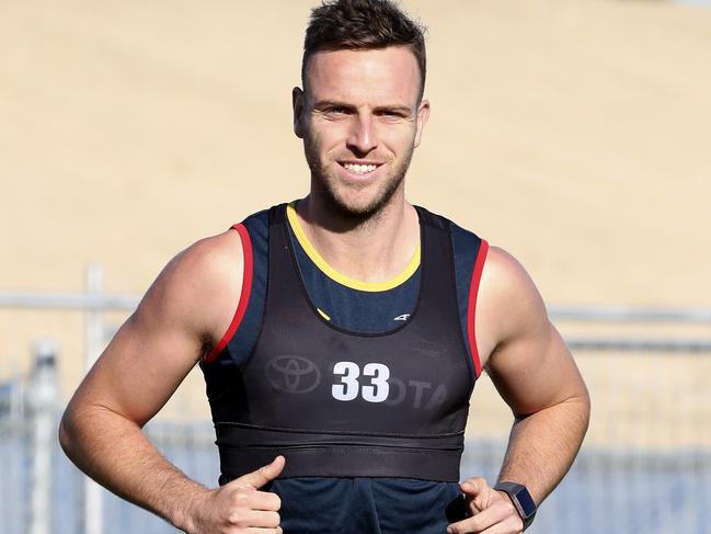 Crows training (warm-up) at Football Park. Brodie Smith runs laps. Picture SARAH REED