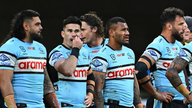 MELBOURNE, AUSTRALIA - SEPTEMBER 14:  Sharks players look on after a Storm try during the NRL Qualifying Final match between Melbourne Storm and Cronulla Sharks at AAMI Park on September 14, 2024 in Melbourne, Australia. (Photo by Quinn Rooney/Getty Images)