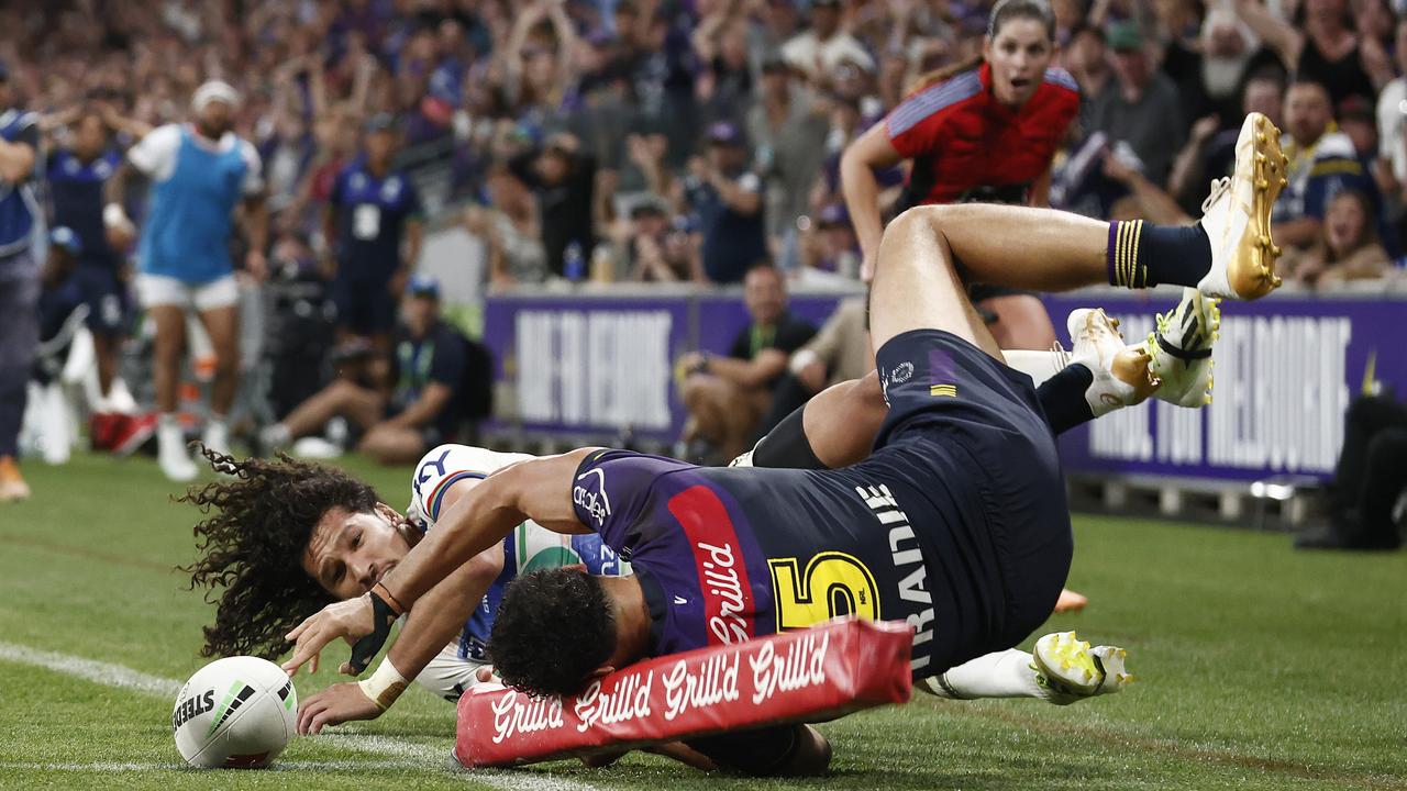 Coates touches down and touch judge Kasey Badger can’t believe it. Picture: Getty Images