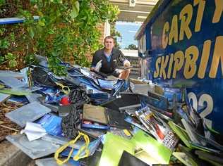 LOW-BLOW: Blockbuster Gympie David Kendall was in shock to find the outside of Blockbuster trashed. Picture: Renee Albrecht