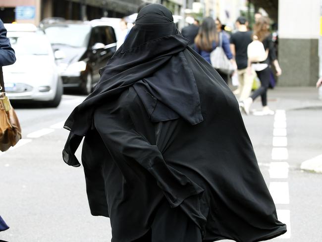 NO BYLINE PLEASE: Moutia Elzahed leaves John Maddison Tower during a break in court proceedings.