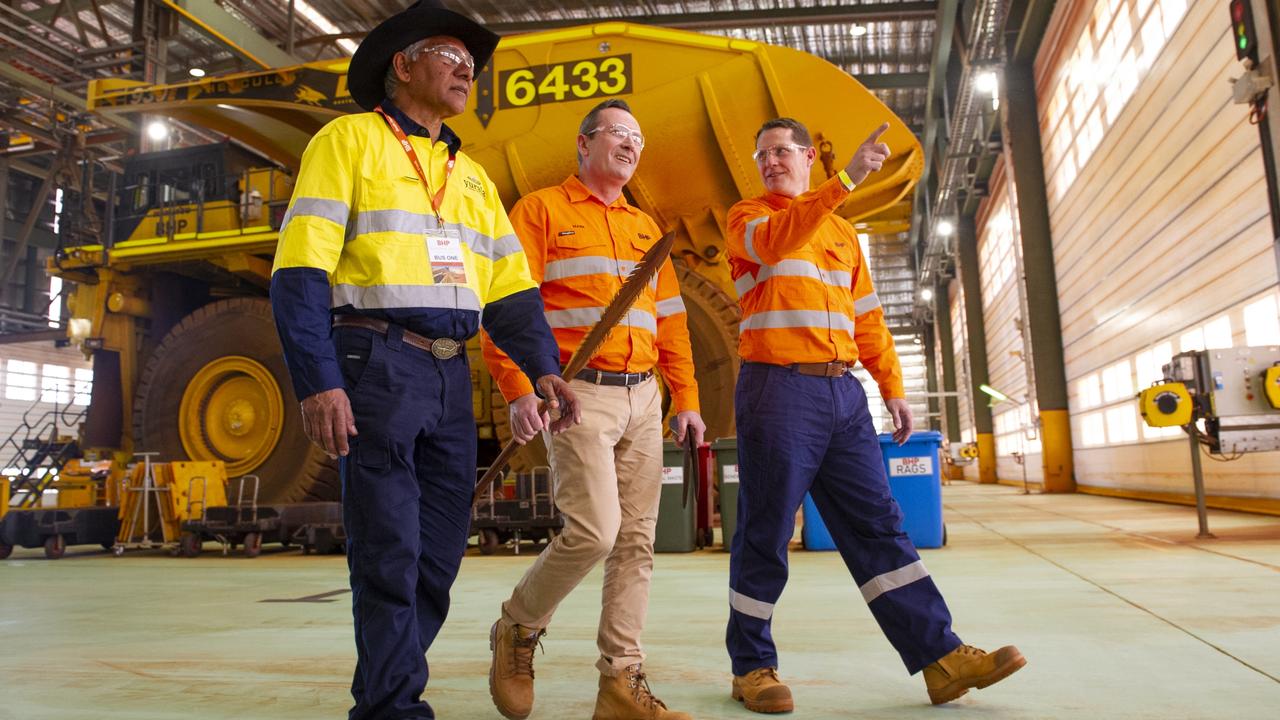 WA Premier Mark McGowan (centre) with Banjima traditional owner Charlie Smith (left) and WA iron ore asset president Brandon Craig at the South Flank opening ceremony on Thursday. Picture: Stewart Allen/BHP.