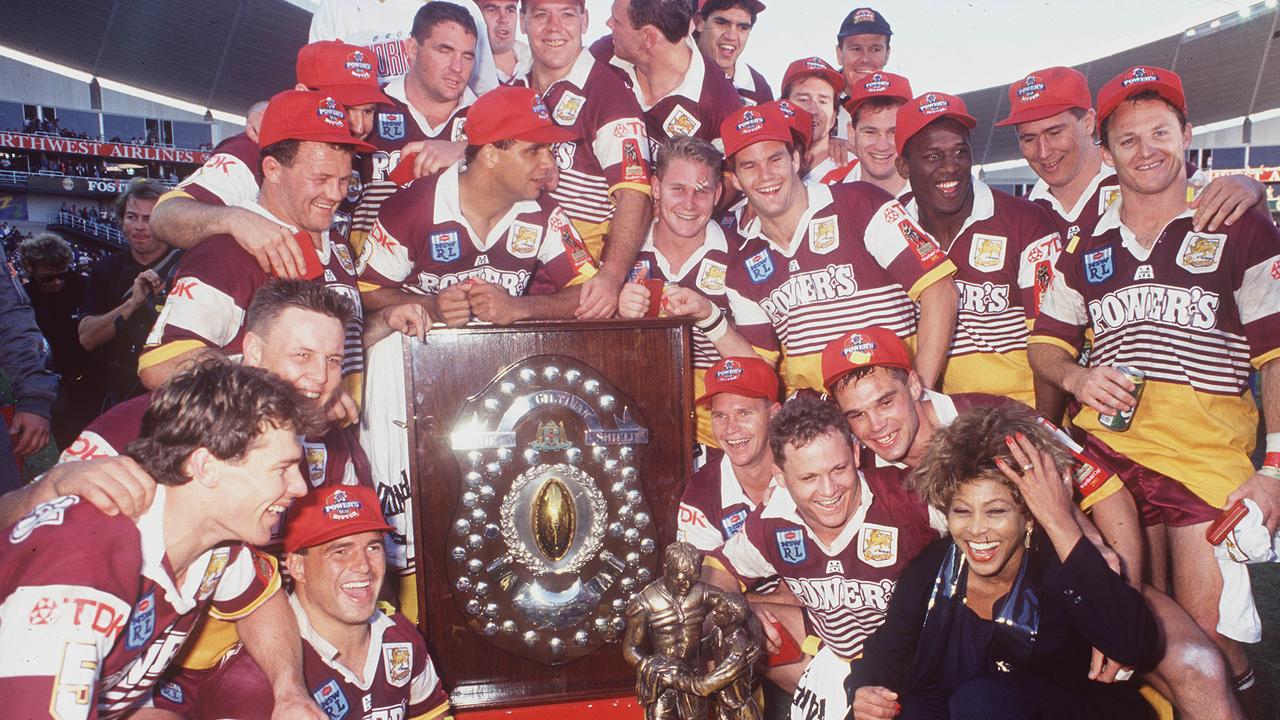 The victorious Brisbane Broncos with Tina Turner after their Grand Final win 1993. Photo: Colin Whelan.