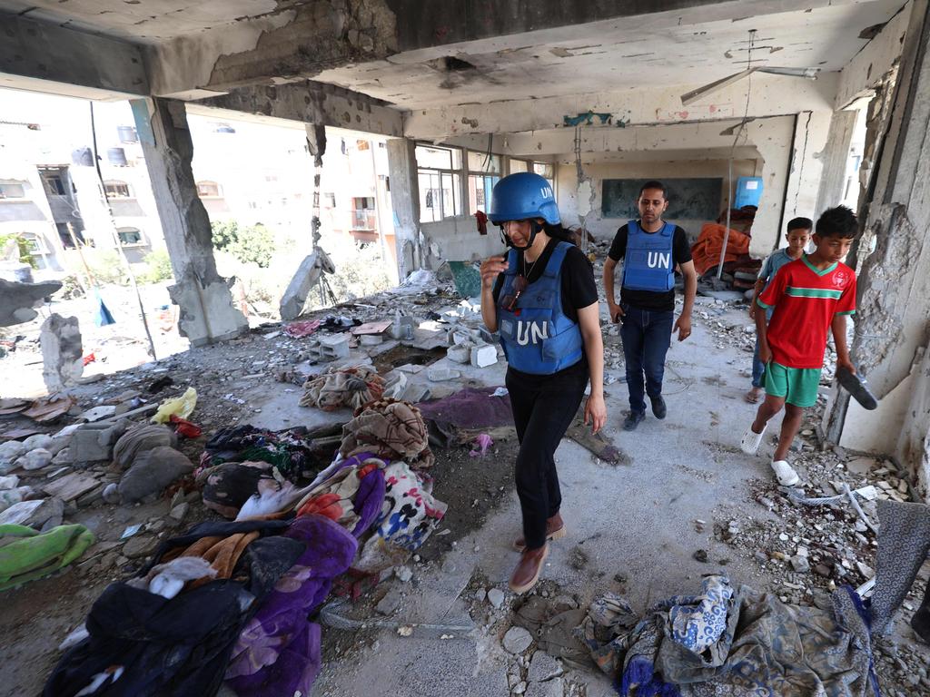 Members of a United Nations investigation team visit a school run by the UNRWA which was hit during an Israeli army strike. Picture: AFP