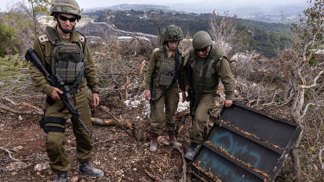 Israeli soldiers show a Hezbollah attack tunnel near a UN peacekeeping position. Picture: AFP.