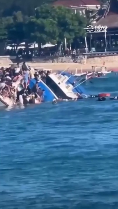 Terrifying moment ferry sinks