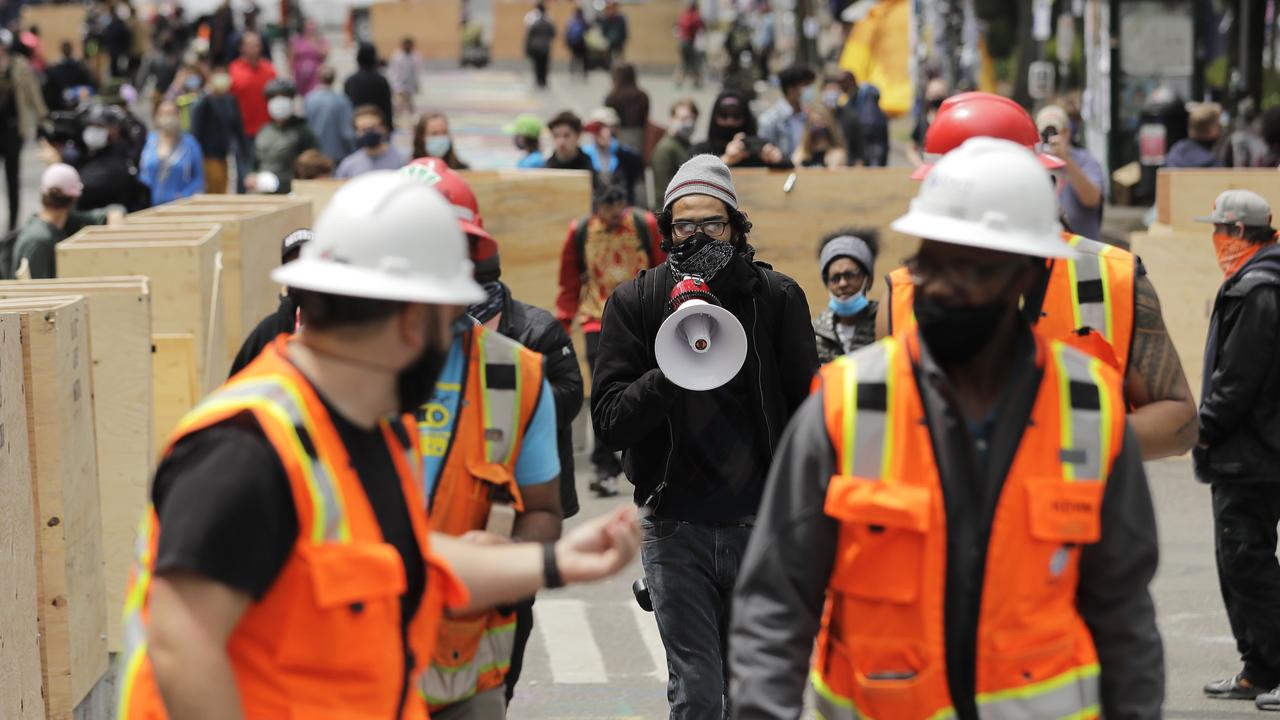 During the daytime, the area is filled with speakers, information booths, free food and music. Picture: Ted S. Warren/AP