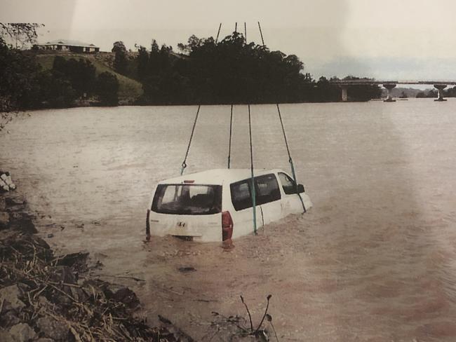 The family’s van slid off the road and into the Tweed River. This photo was part of evidence in the coronial inquest. Photo: Supplied