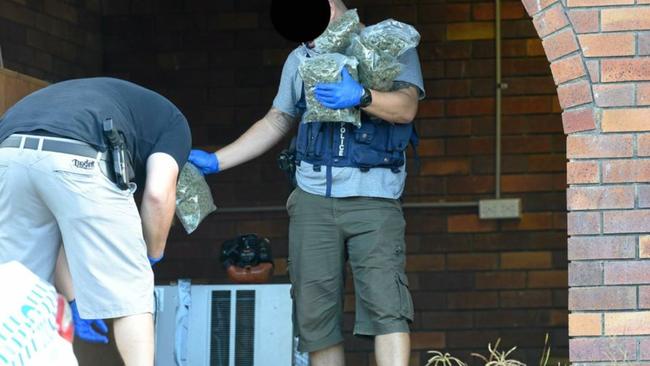 Police search a house in Lismore. Picture: Marc Stapelberg.