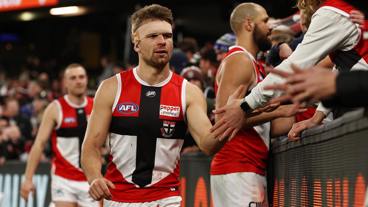 Dan Butler still managed to celebrate the victory with Saints fans. Picture: Michael Klein