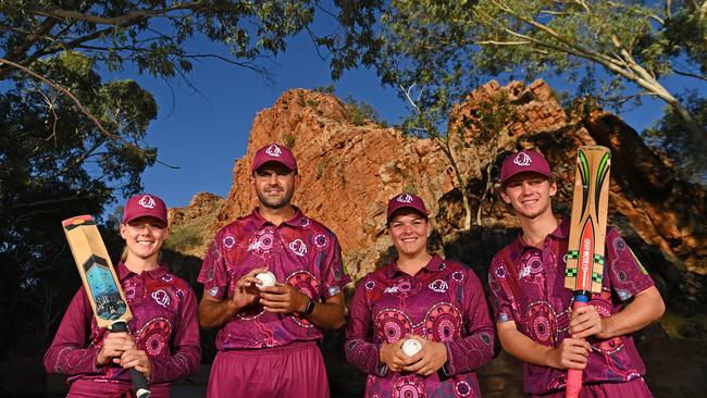 Grace Abdy, Jake Coolwell, Courtney Fewqaundie and Noah Vojinov of Queensland pose for portraits during the 2024 National Indigenous Cricket Championships at Emily Gap in Alice Springs. Picture: Albert Perez /Cricket Australia via Getty Images