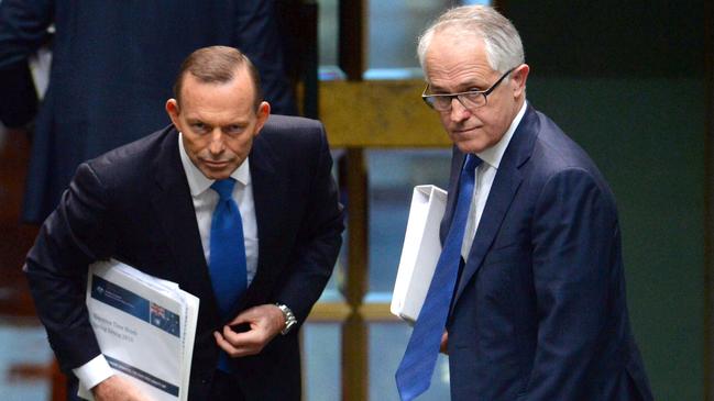 Tony Abbott (left) and Malcolm Turnbull were peas in a pod with their matching navy suits and blue ties. Picture: AAP Image