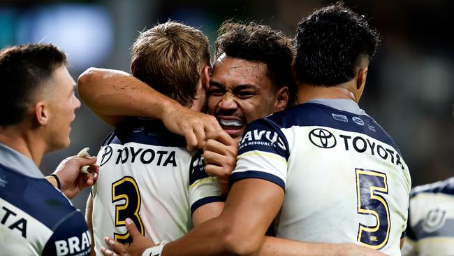 SYDNEY, AUSTRALIA - APRIL 04: Jaxon Purdue of the Cowboys celebrates with team mates after scoring a try during the round five NRL match between Penrith Panthers and North Queensland Cowboys at CommBank Stadium, on April 04, 2025, in Sydney, Australia. (Photo by Brendon Thorne/Getty Images)