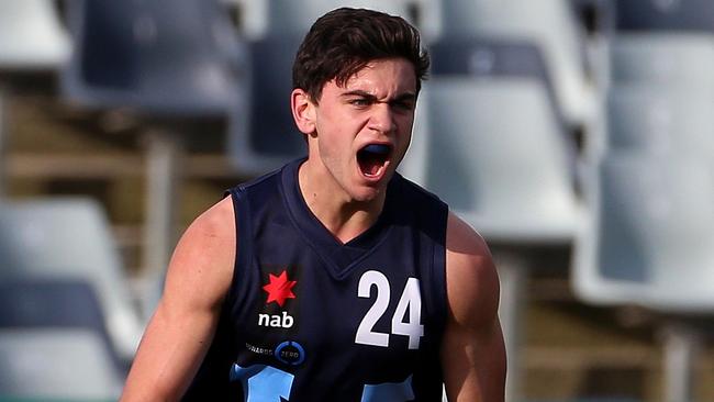 Tim Taranto celebrates a goal for Vic Metro. Picture: Mark Dadswell.