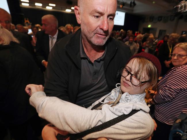 Amber Holt is dragged from the scene at the CWA function. Picture: Alex Coppel. 