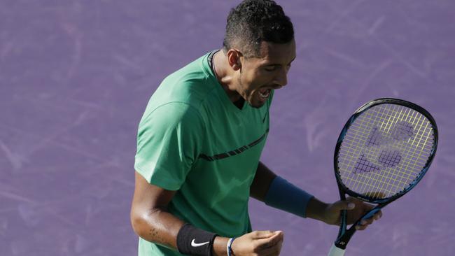 Nick Kyrgios wins a big point against Ivo Karlovic at the Miami Open. Picture: AP
