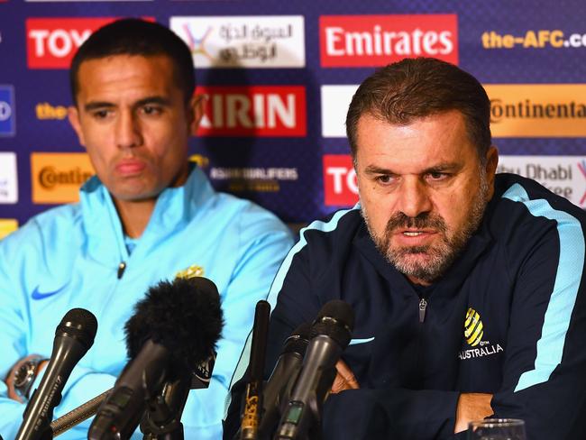 Cahill and Postecoglou at a press conference ahead of the Socceroos’ clash against Thailand.