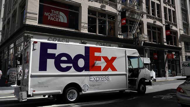 The FedEx logo, is simple yet includes a secret message hidden within. Picture: FP PHOTO / GETTY IMAGES NORTH AMERICA / JUSTIN SULLIVAN