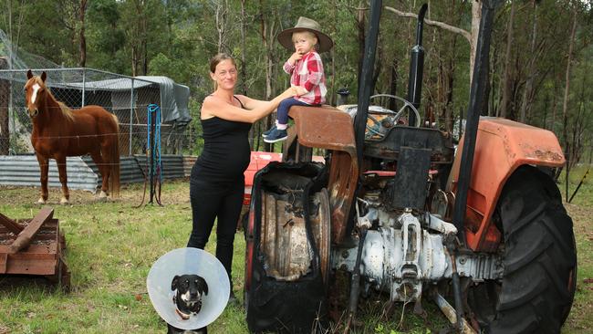 Nymboida bushfire recovery volunteer Georgia Foster Eyles with her daughter, Maisy, 2. Picture: Toni Fuller