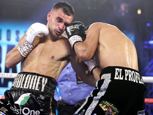 LAS VEGAS, NV - NOVEMBER 14: Joshua Franco and Andrew Moloney exchange punches during their fight for the WBA super flyweight title at the MGM Grand Conference Center on November 14, 2020 in Las Vegas, Nevada. (Photo by Mikey Williams/Top Rank Inc via Getty Images)