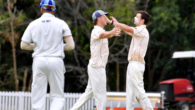 Norths players celebrate a wicket Sci-Fleet Motors club cricket competition between Valley and Norths. Picture, John Gass