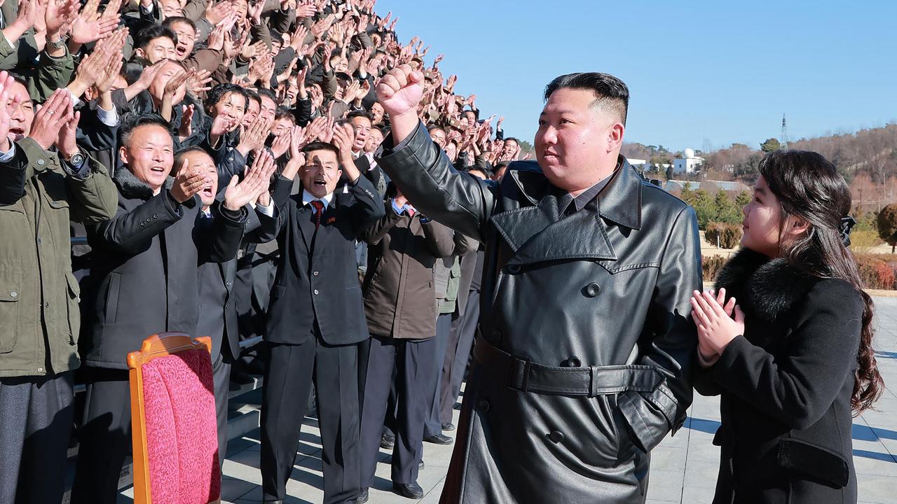 North Korea's leader Kim Jong-un and his daughter at a munitions factory. Picture: KCNA VIA KNS/AFP