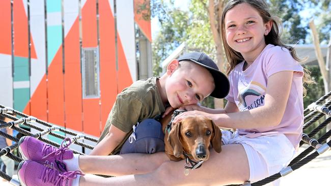 Two kids with their dog Trevor at Bungarribee Park in Blacktown. Picture: Jeremy Piper