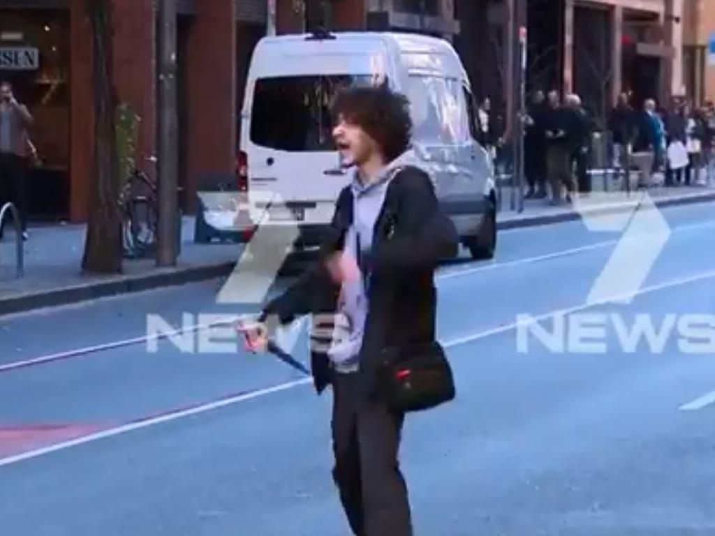 The man was seen holding a large knife. Picture: 7 News.