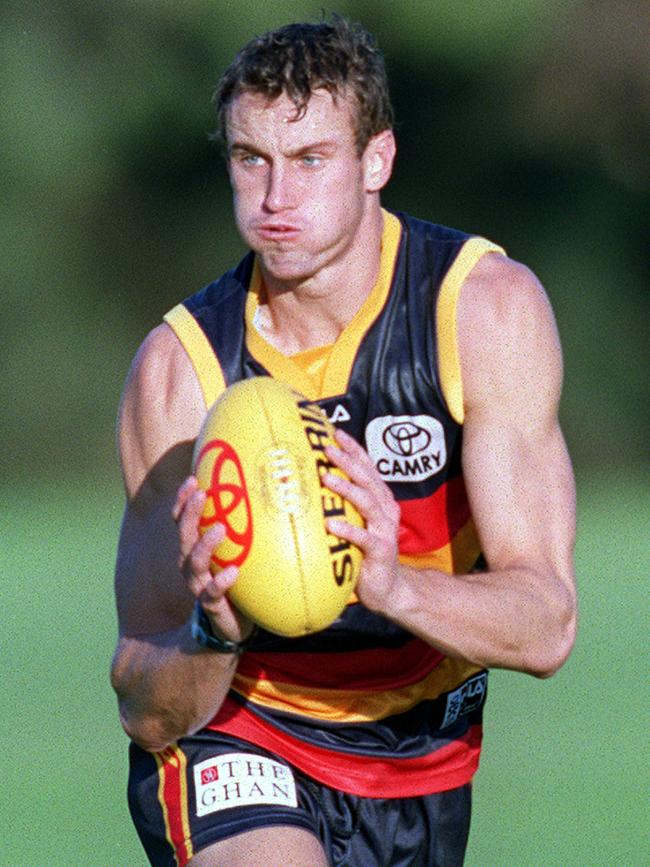 … and at Adelaide Crows training in 2002.