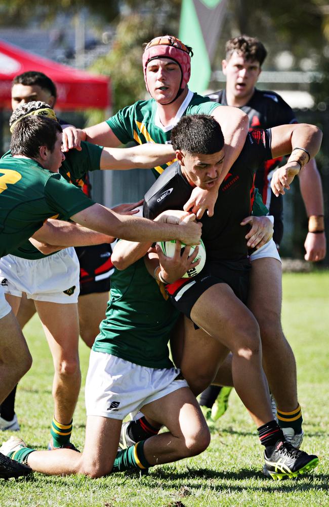 Farrer struggled to contain a rampaging Endeavour Sports High forward pack in Round 1. Picture: Adam Yip