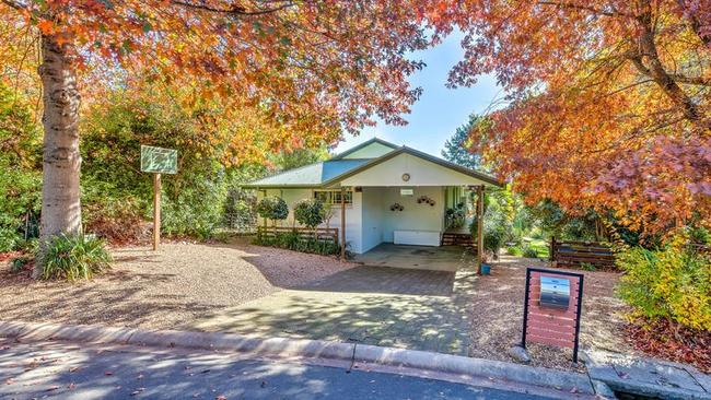 5 Woodlands Grove, Bright, is a four-bedroom house with a $1.249m price tag. The town was Victoria’s top-performing area for median house price rises in the last financial year.