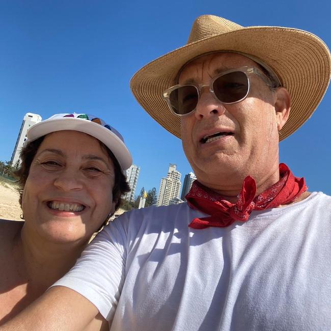 A fan with Tom Hanks on the beach on the Gold Coast on Wednesday. Picture: Twitter / Joanne Dileo