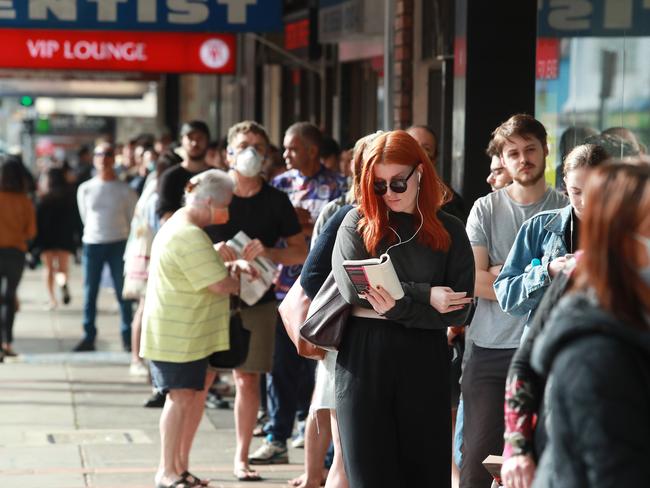 24/3/20: People queue at Centrelink at Marrickville. John Feder/The Australian.