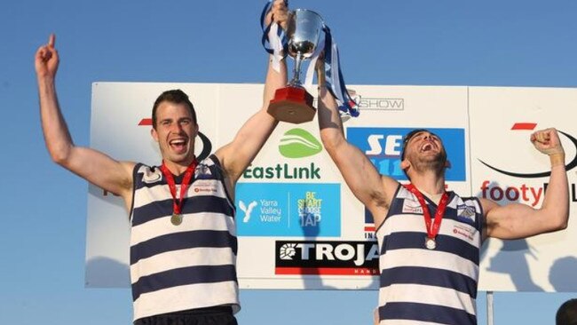 Matt Schimmelbusch and Chris Annakis hoist the 2015 premiership cup. Picture: Stuart Milligan